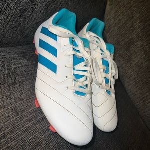 Women’s 8.5 adidas soccer cleats.